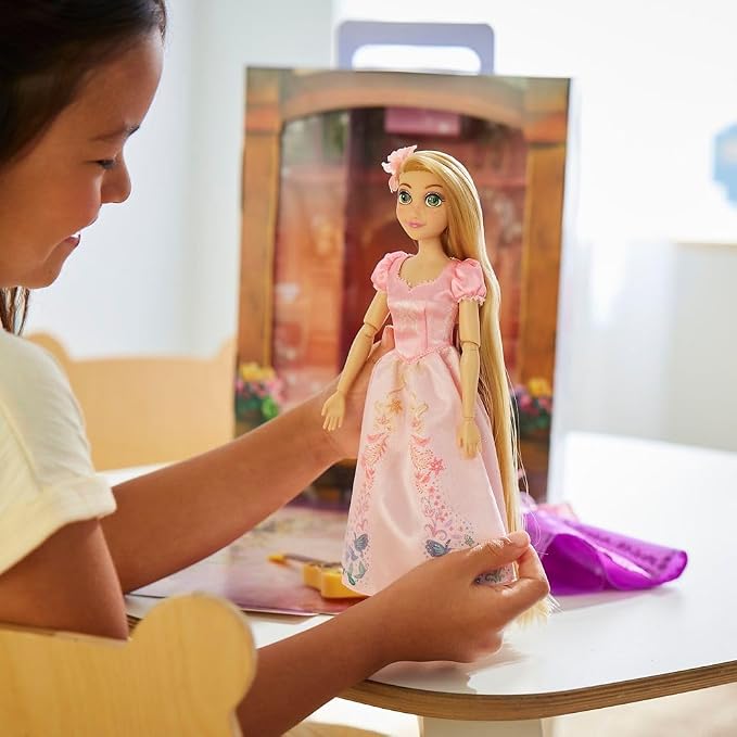 Disney Store Official Rapunzel Story Doll - 11 Inches - Includes Coloring Book and Additional Dress, Princess Doll in Classic Outfit, Disney Princess Toys for Girls