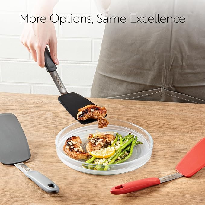 Restaurantware Comfy Grip 12 x 3 Inch Silicone Turner 1 Durable Cooking Turner - Stainless Steel Body Rubber Handle With Hole Black Silicone Flipper Spatula Tolerates Up To 446F Dishwashable